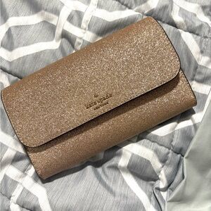 Kate Spade Tinsel Boxed Medium Phone Wristlet in glitter rose gold